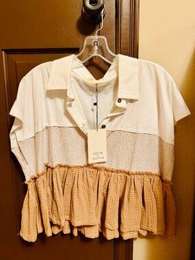 Stitch and Feather Peplum Top